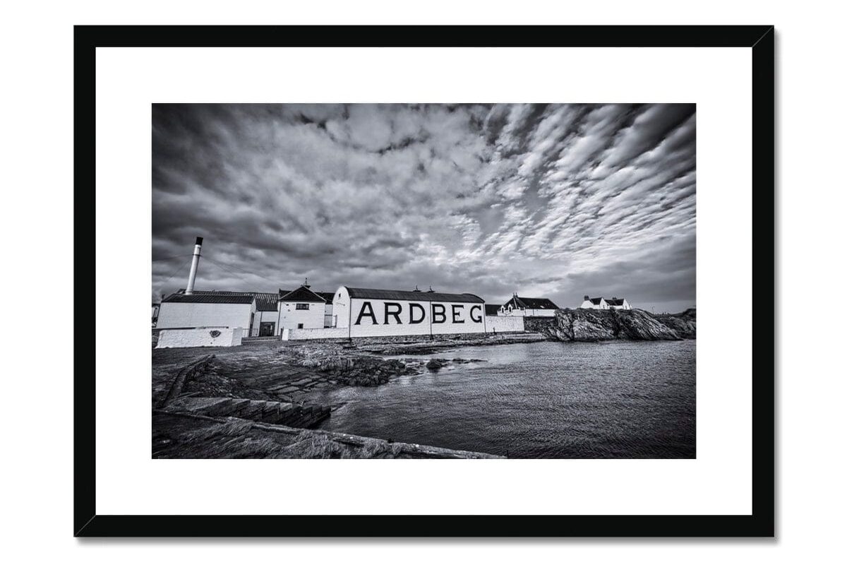 Black framed art print of Ardbeg Distillery, black and white photograph
