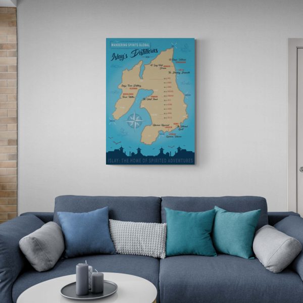 blue toned illustrated map of islay and her whisky distilleries. a blue couch with different blue shade cushions is in the foreground.